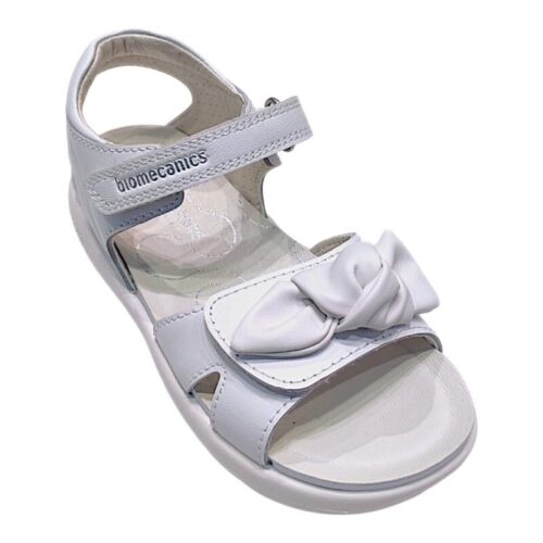Sandalo bianco per bambina con fiocco sulla fascia a strappo e strappo sulla caviglia – Biomecanics